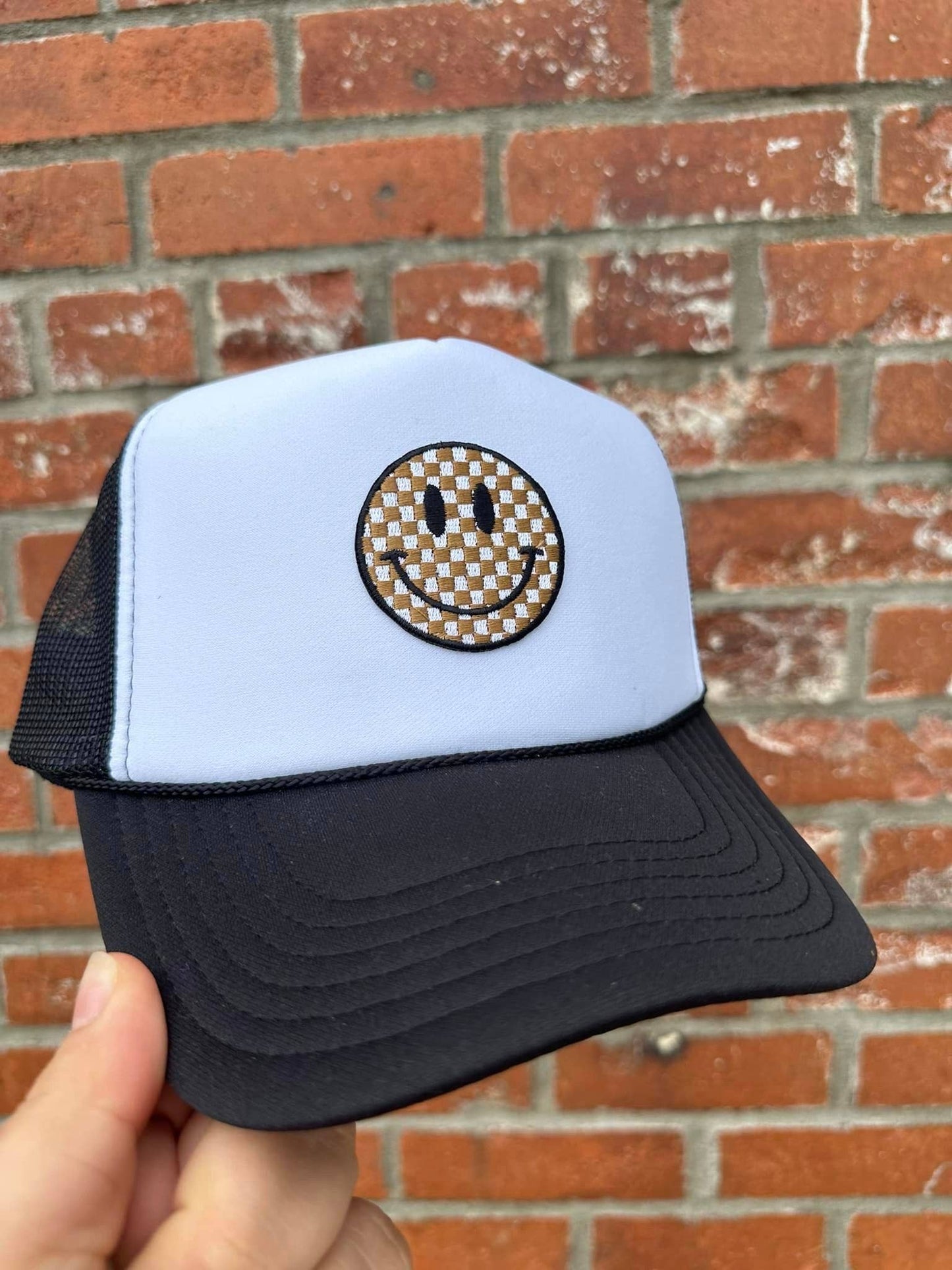 Checkered Smiley Face Trucker Hat