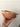 a hand holding a bowl