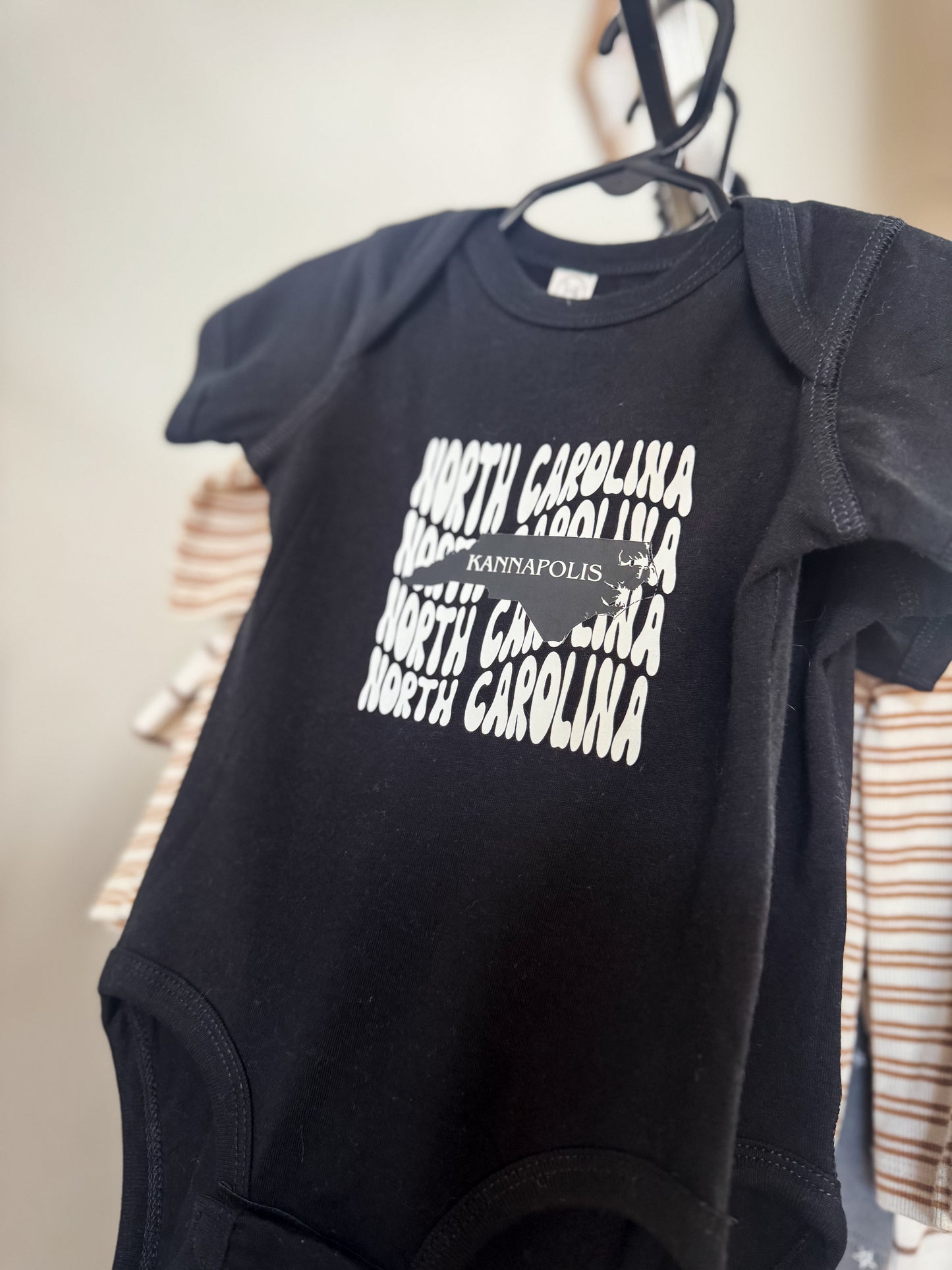 Kannapolis NC Wave Onesie - Black