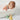 a baby in a bathtub with rubber ducks