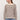 a woman in a sweater