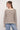 a woman in a sweater