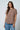 a woman in a striped shirt