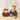 a baby crawling next to a stuffed animal