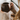 a person holding a cup