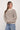 a woman in a striped sweater