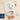 a white toy with a duck shaped object