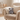 a stuffed elephant on a chair