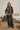 a woman standing in a room