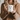 a person holding a mug
