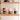 a group of coffee mugs on a shelf