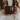 a person holding a mug