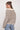 a woman in a sweater
